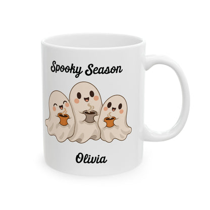 Spooky Season ghost design with a name on a white ceramic mug, view 1